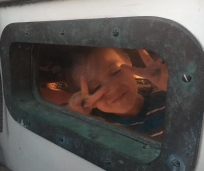 Cody thru his bunk porthole
